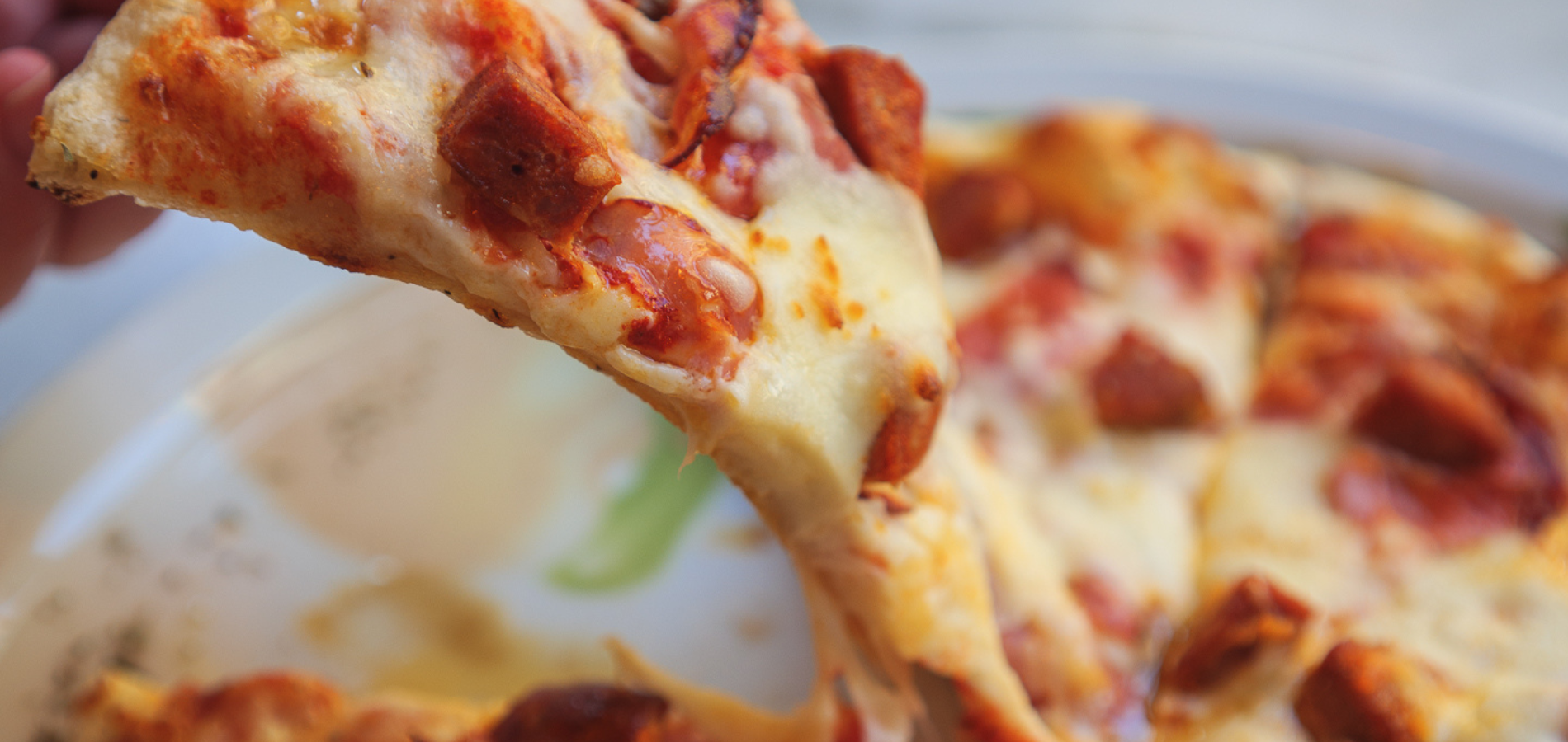 photo of Capuricciosa pizza . thin crust dough, cheese, Italian sausage and capicollo